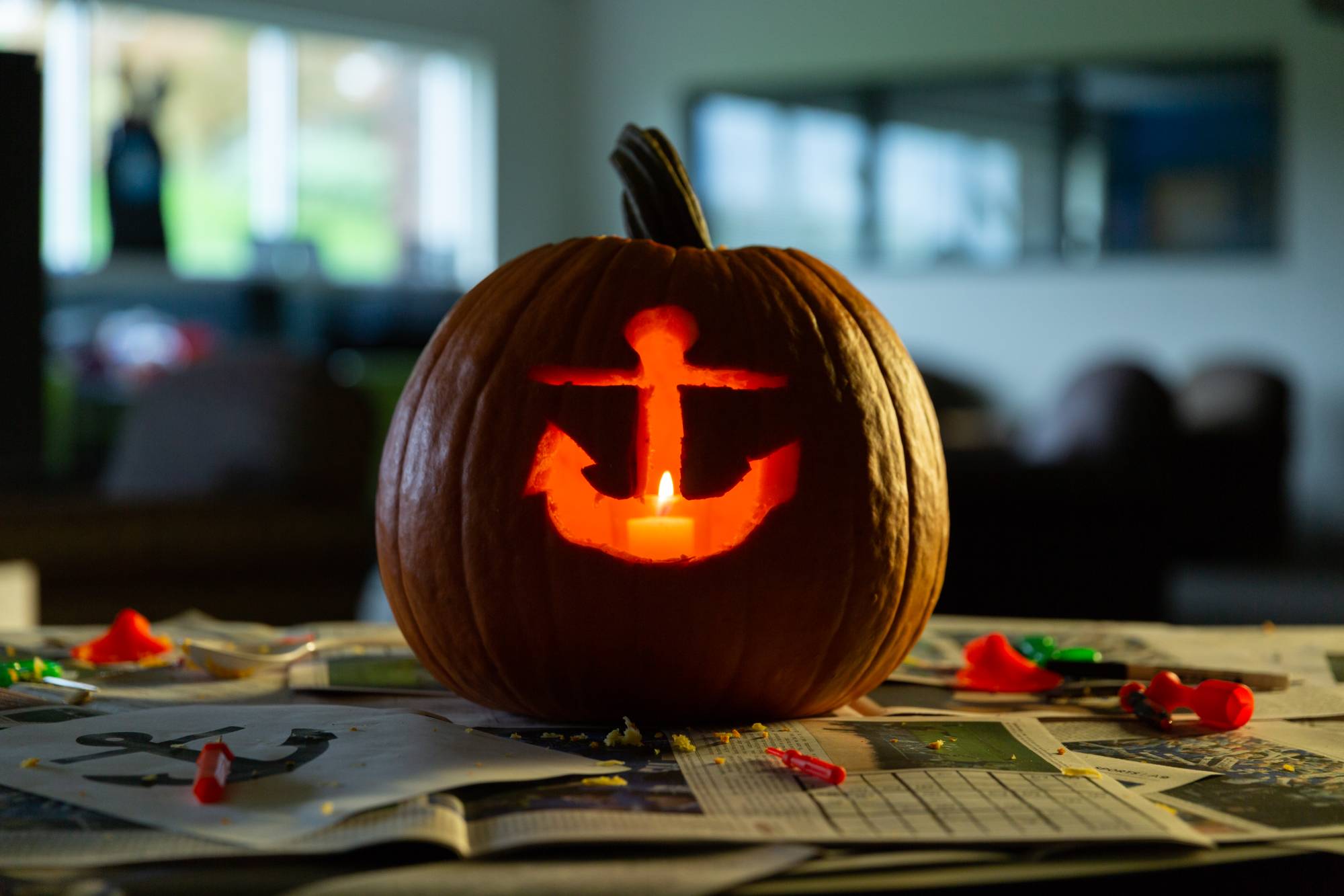 Pumpkin with anchor carved into it